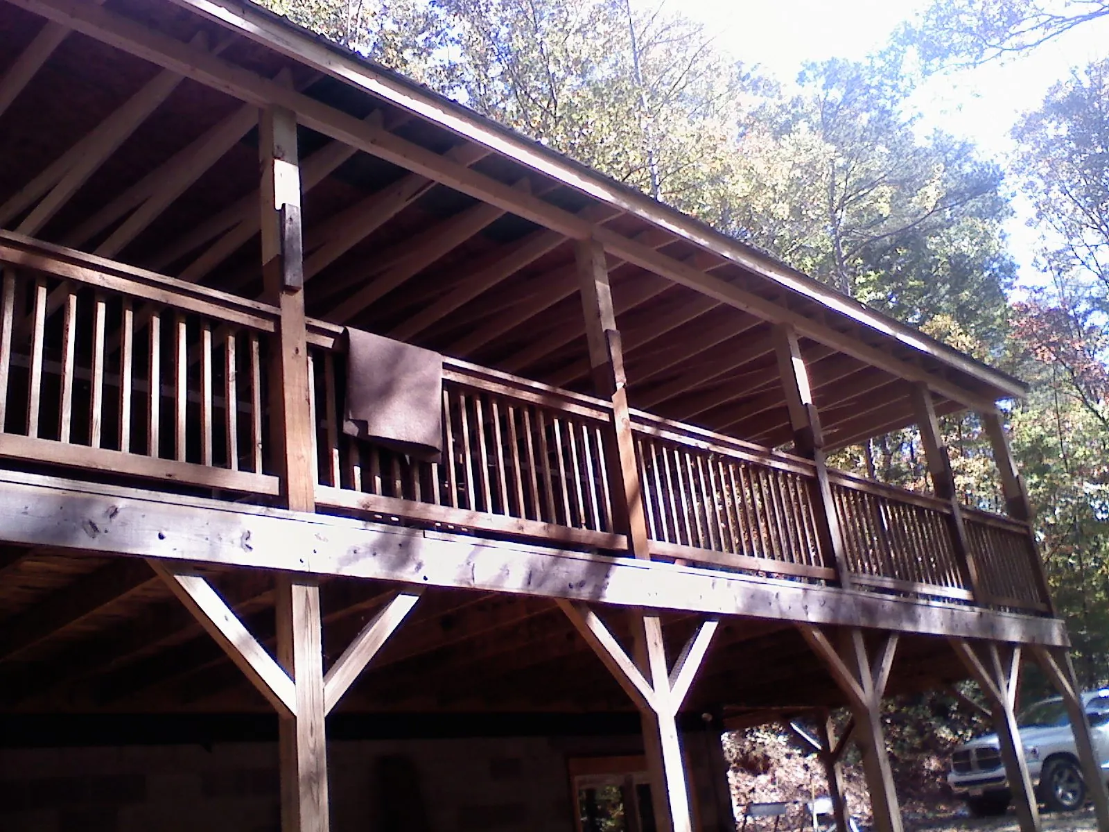 Timber framing under a new elevated porch and deck — Roof Leak Repair in Hiddenite by Roofing Brothers